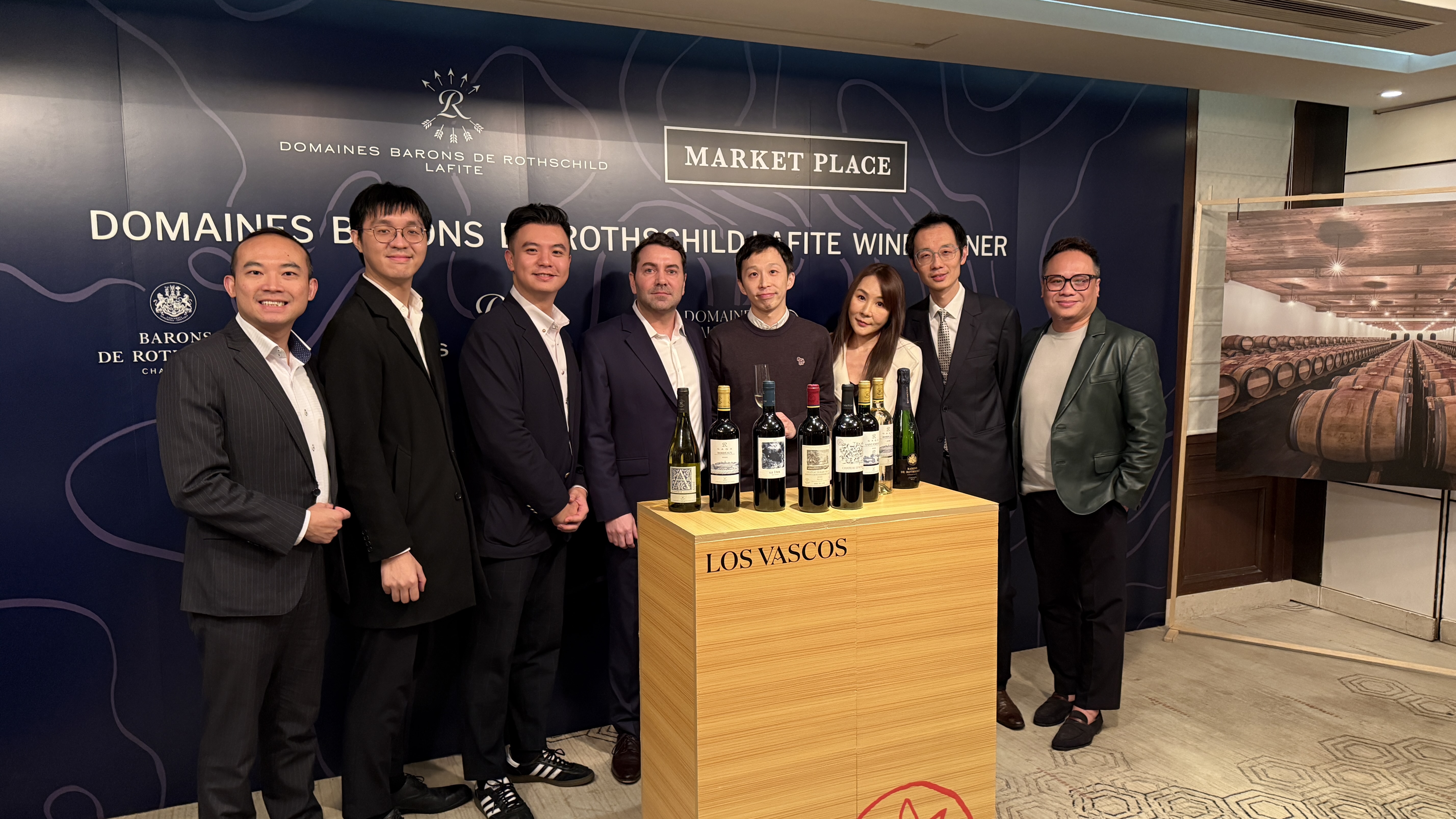 Group photograph at a Domaines Barons de Rothschild Lafite wine dinner with Market Place